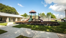 outside playscape with sidewalks